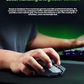 Razer DeathAdder V3 HyperSpeed underside showing Focus X 26K sensor and PTFE feet