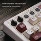 Top-down view of the 8BitDo Retro 108 mechanical keyboard featuring a full 108-key layout, retro-inspired keycap colors, and an attached dual-button controller with A and B inputs. Designed for both typing and retro gaming, it blends vintage style with modern mechanics.