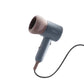 Babycare baby hair dryer in gray and beige color, quiet operation and low radiation design for safe use on infants and toddlers