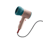 Babycare baby hair dryer in pink and teal color with soft airflow design, ideal for safe and gentle drying of infant and toddler hair