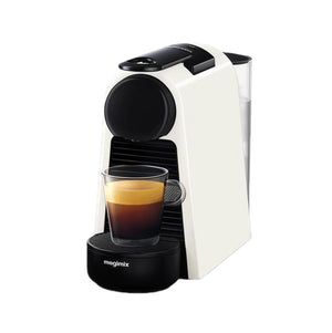 De'Longhi Essenza Mini EN85WAE capsule coffee machine in white, brewing a cup of coffee.