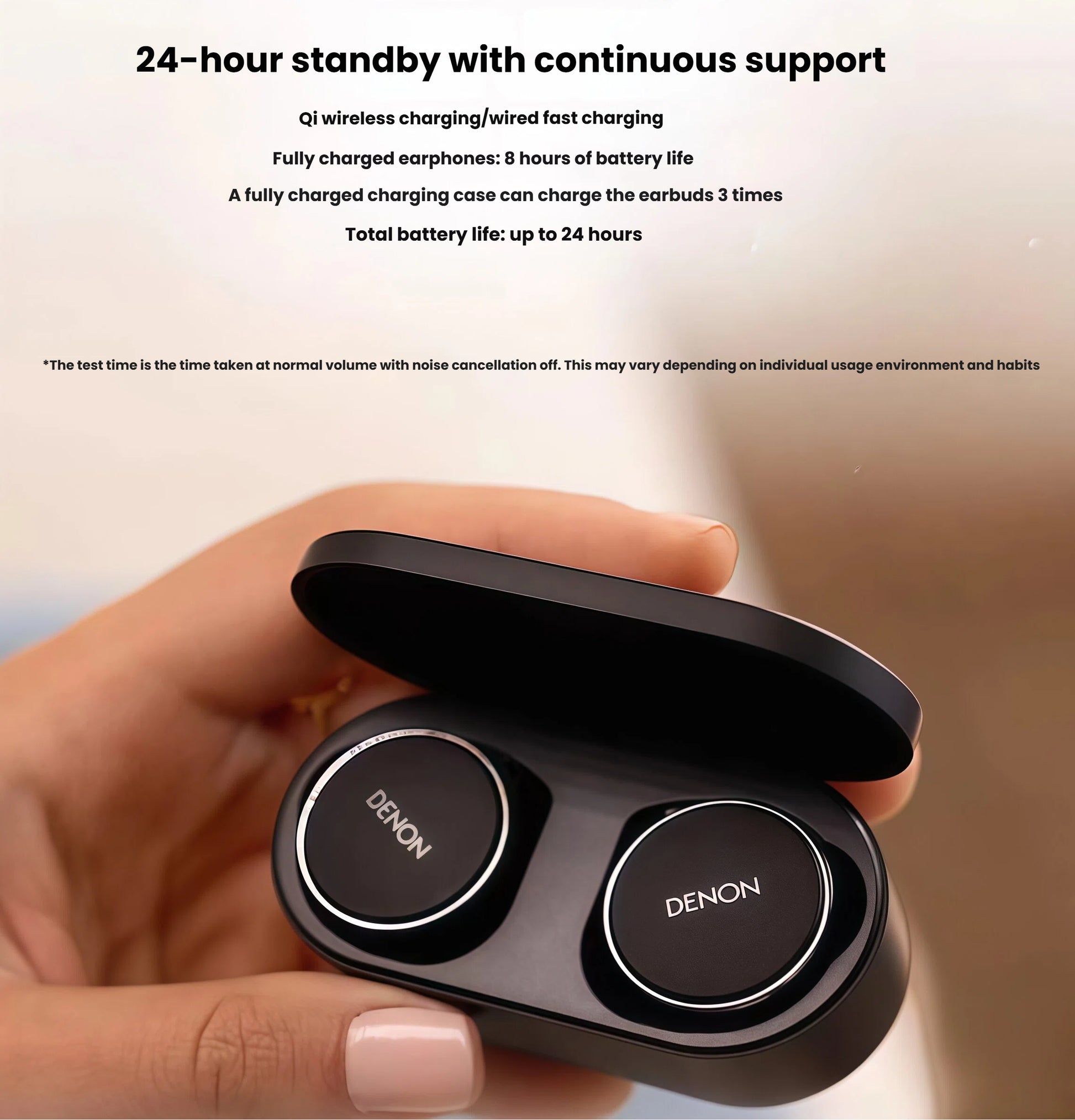 Hand holding Denon PerL Pro charging case with earbuds inside — offering 8 hours of battery life per charge and up to 24 hours total playtime with Qi wireless and wired fast charging support.