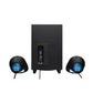 Back view of the Logitech G560 2.1 speaker set showing the subwoofer’s rear I/O panel and the two satellite speakers with blue LIGHTSYNC RGB lighting.