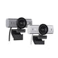 Side-by-side comparison of the graphite and white MX Brio 4K webcams, both mounted on adjustable clips, emphasizing color options for any setup.
