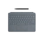 Top view of the Microsoft Surface Pro 12-inch keyboard cover in gray, featuring a full-sized backlit keyboard, integrated trackpad, and included Slim Pen for precise note-taking and drawing on Windows tablets.
