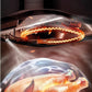  A close-up of a whole chicken being cooked in the Midea Air Fryer, illustrating the 3D water mist and steam technology that hydrates food to lock in moisture for perfectly tender and juicy results.
