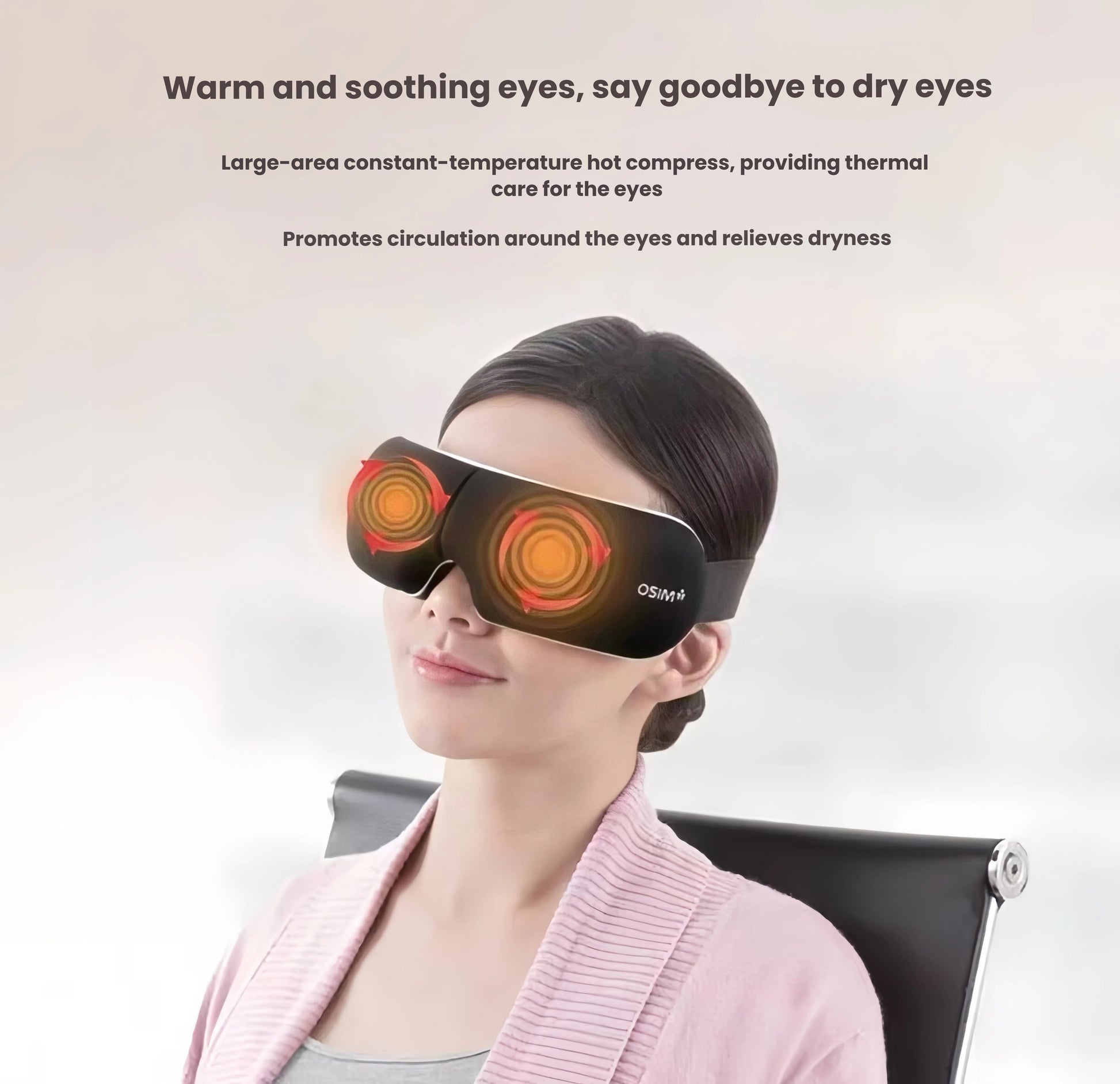 Woman wearing the OSIM uVision Air eye massager with glowing heat zones around both eyes. The device provides soothing thermal care to relieve dryness, promote circulation, and reduce eye fatigue from screen use.