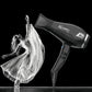 Artistic black and white image of a dancer in flowing dress next to a Parlux Alyon hair dryer, symbolizing powerful airflow and graceful hair movement.