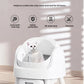 White PetPivot cradle basin with a white cat inside — open-top design reduces anxiety, supports natural digging behavior, stays clean for 24 hours