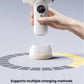 SKULD baby hair dryer charging wirelessly on base; supports home power supply, portable power bank, and car charger for flexible use at home or on travel