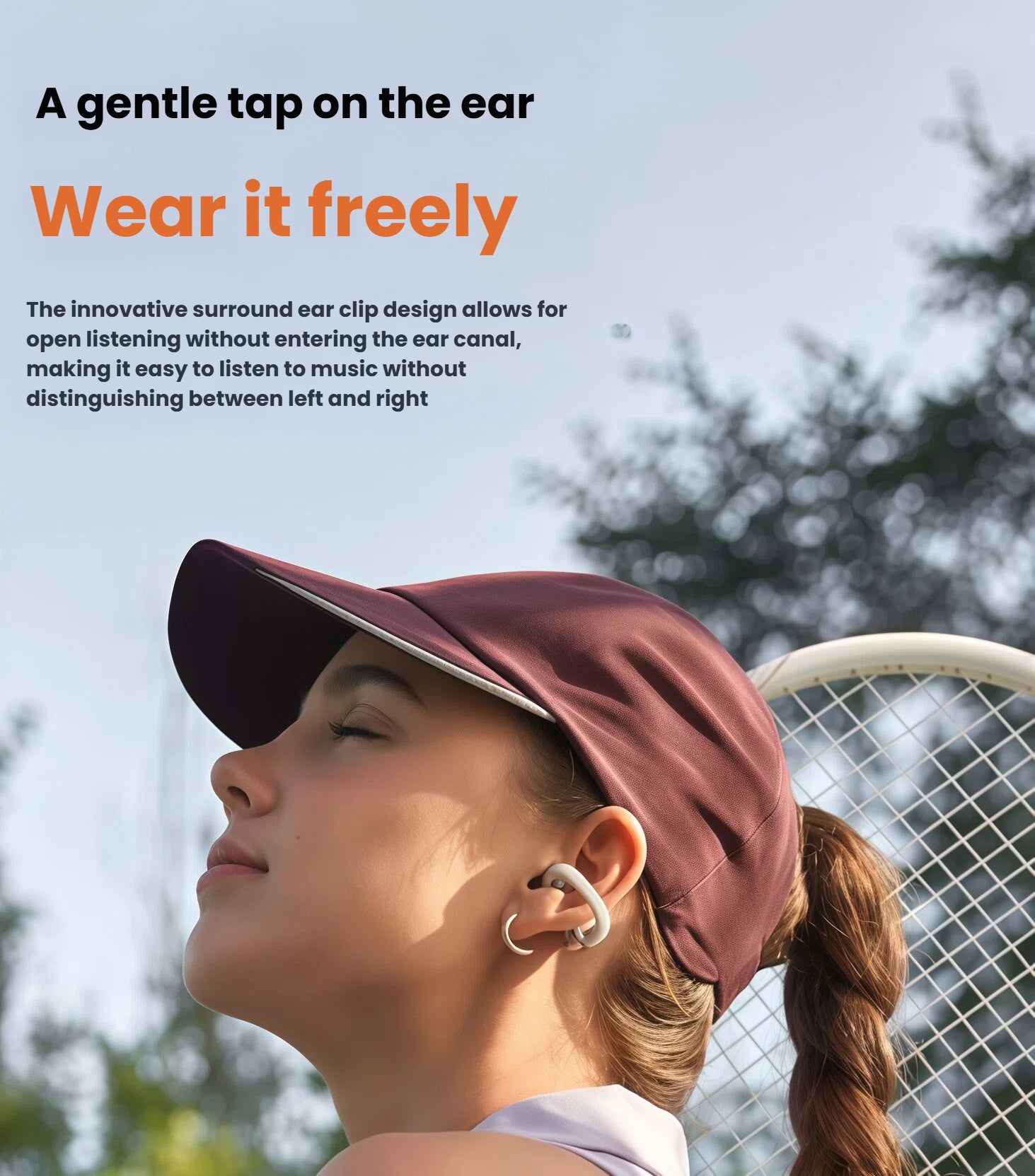 Woman wearing white Shokz OpenDots One open-ear earbuds while playing tennis — innovative surround ear clip design allows safe, open listening without blocking ear canal.