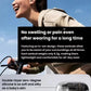 Woman riding bike with Shokz OpenFit wireless earbuds — lightweight in-ear design with double-layer zero-degree silicone for soft, pain-free wear.
