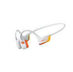 Shokz OpenRun Pro 2 white earbuds with orange accents showing modern design and dual-unit audio technology