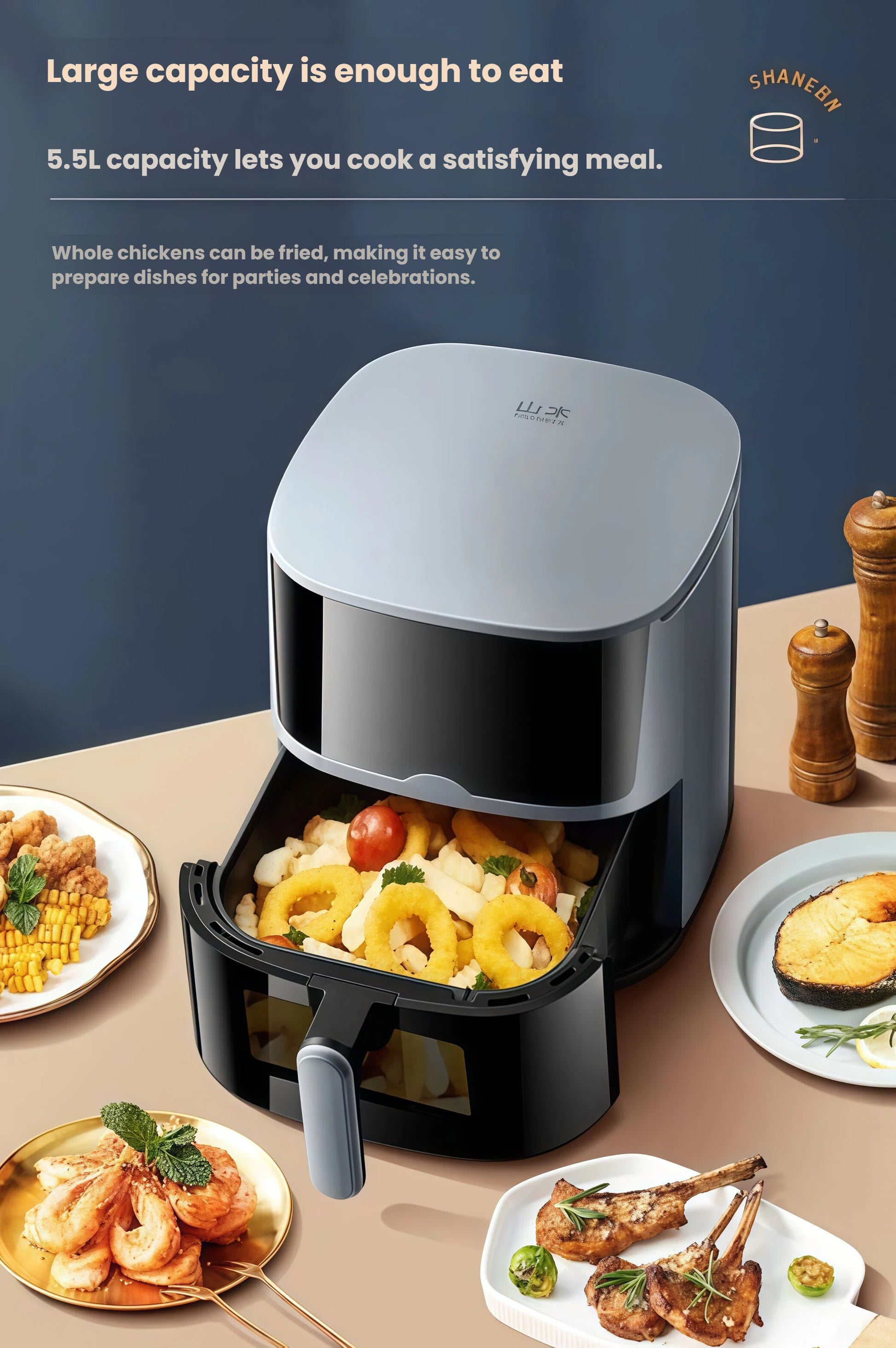 The Yamazen air fryer's open 5.5L basket is filled with food, surrounded by various delicious dishes like fried shrimp, lamb chops, and salmon, showcasing its large capacity for parties and family meals.