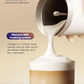 Philips Baristina milk frother pouring foam into coffee