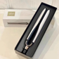 ghd Platinum+ Smart Styler in black presentation box with white model inside. Elegant packaging includes branded box and protective sleeve—perfect for gifting or travel.