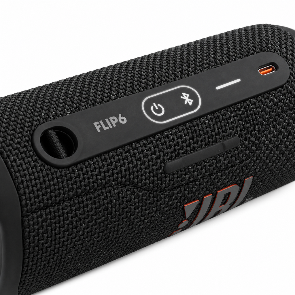 Close-up of the JBL Flip 6 USB-C charging port and control buttons