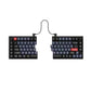 Top view of Keychron Q11 split mechanical keyboard featuring full QWERTY layout, red escape and enter keys, black PCB, and dual wired connection against a clean white background.